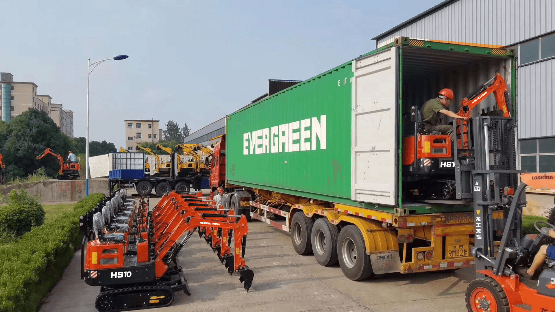 HERESTRONG excavators loaded into a shipping container