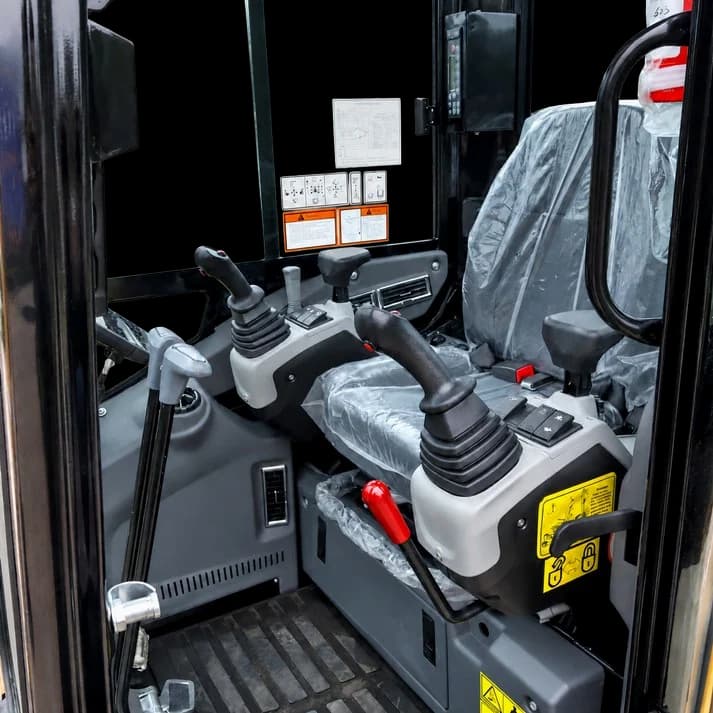 HS38 enclosed cab with operator seat and hydraulic pilot joysticks